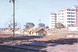 Calcutta,
                    India, squatter settlement along active rail lines.
